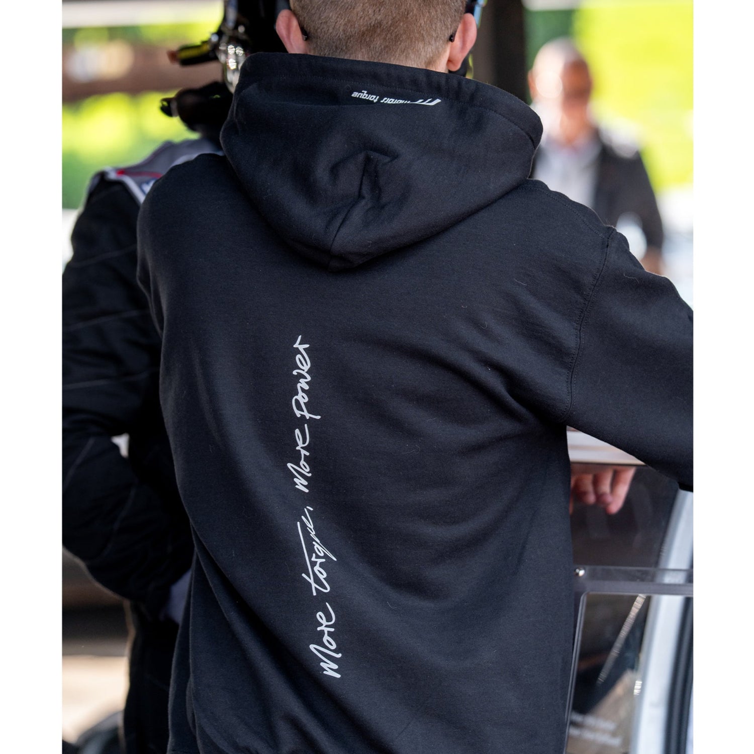 This heavyweight hoodie forms the bonnet of our collection and is designed to become a future classic. Featuring our MT brand on the front with our philosophy ‘more torque, more power’ vertically rising on the back. The names on the hood!
Why black? Well anyone who is around cars knows motor oil gets everywhere. This hoodie makes a sensible choice for anyone around engines. The hoodie that keeps you cosy when our weather thinks otherwise, whilst making a statement and conversation starter for anyone in the