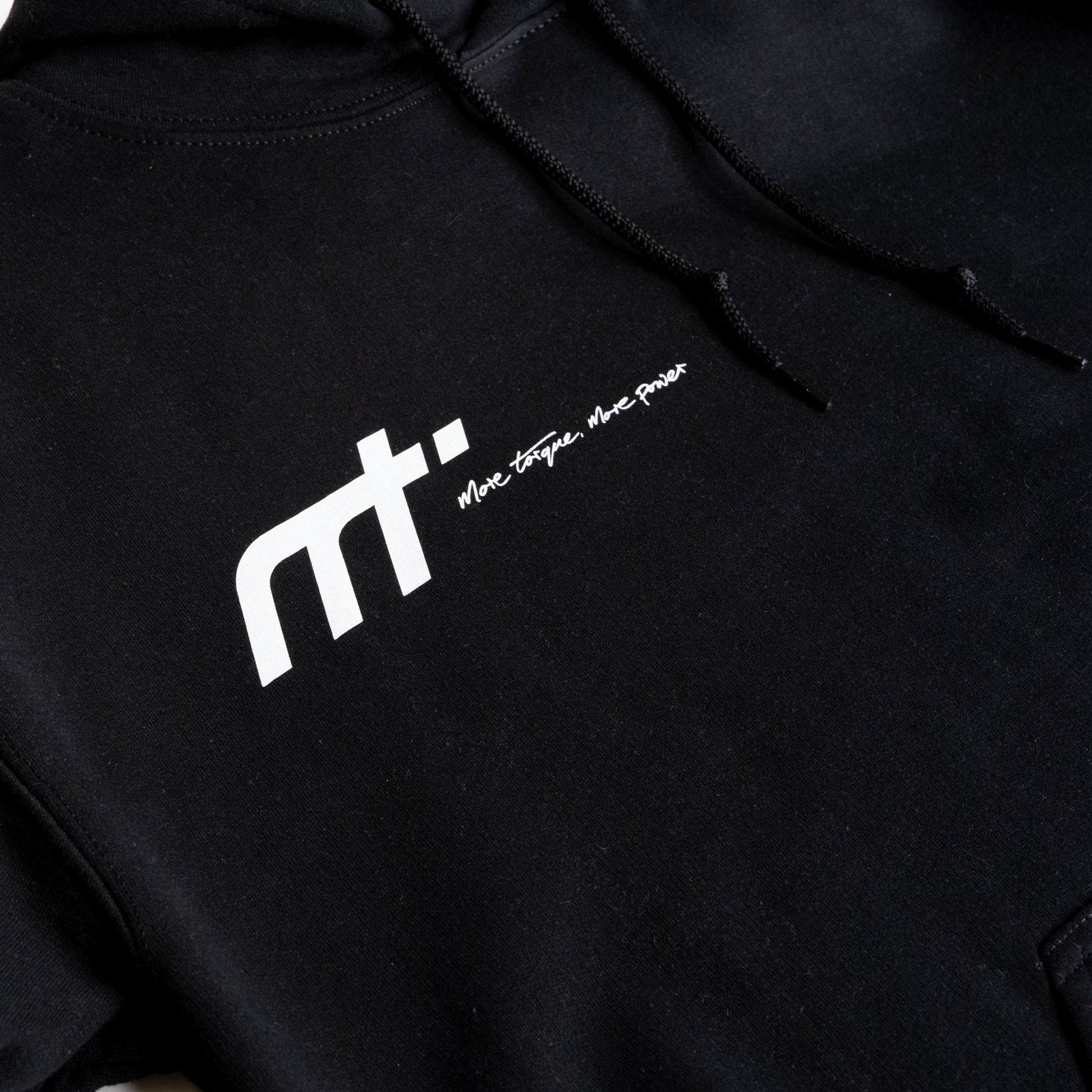 This heavyweight hoodie forms the bonnet of our collection and is designed to become a future classic. Featuring our MT brand on the front with our philosophy ‘more torque, more power’ vertically rising on the back. The names on the hood!

Why black? Well anyone who is around cars knows motor oil gets everywhere. This hoodie makes a sensible choice for anyone around engines. The hoodie that keeps you cosy when our weather thinks otherwise, whilst making a statement and conversation starter for anyone in the