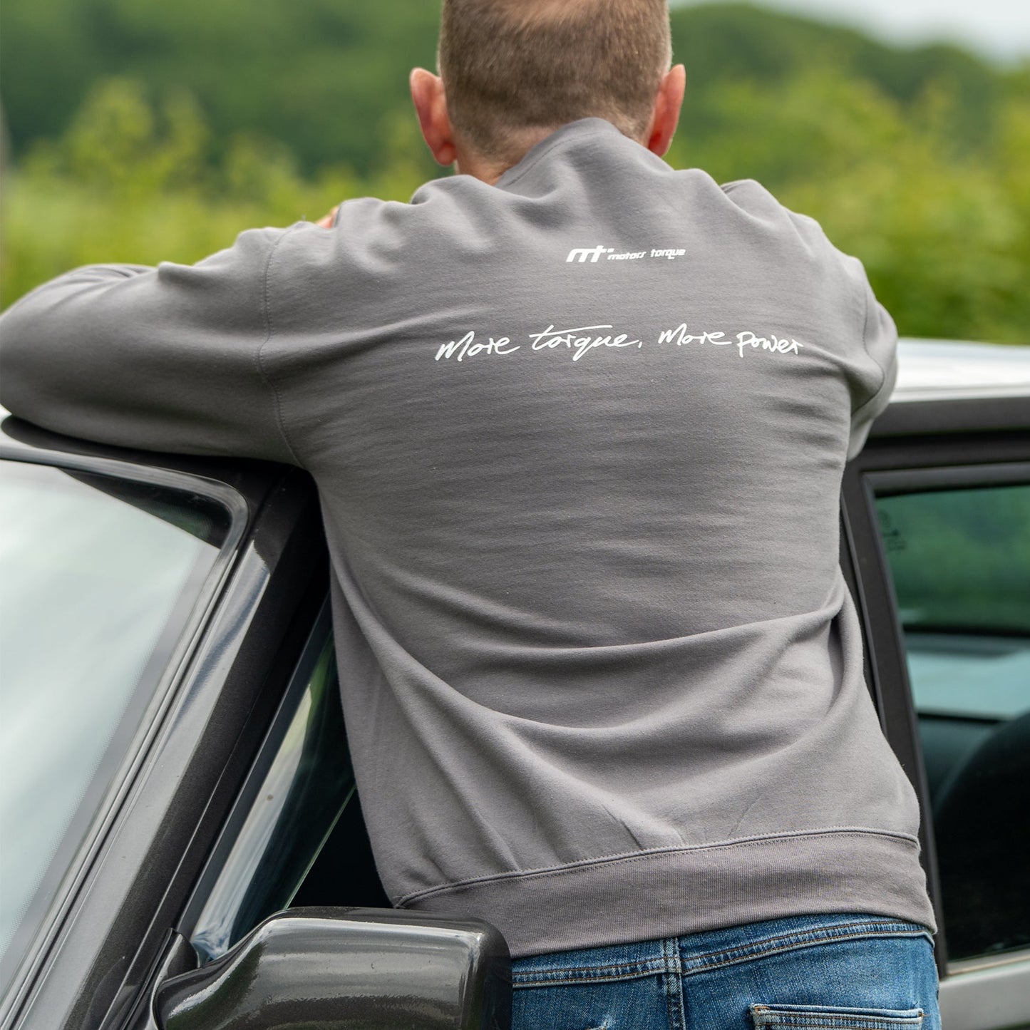 This sweater forms the chassis of our collection and is designed to become a future classic. Featuring our MT brand on the front with our philosophy ‘more torque, more power’ horizontal on the back. Why grey? Well it’s a primer basic and a good base for most colours! Like all our outer gear the sweater keeps you warm when our weather thinks otherwise. It makes a statement and conversation starter for anyone in the motor community.

Our sweatshirts are cosy and durable just like our community.